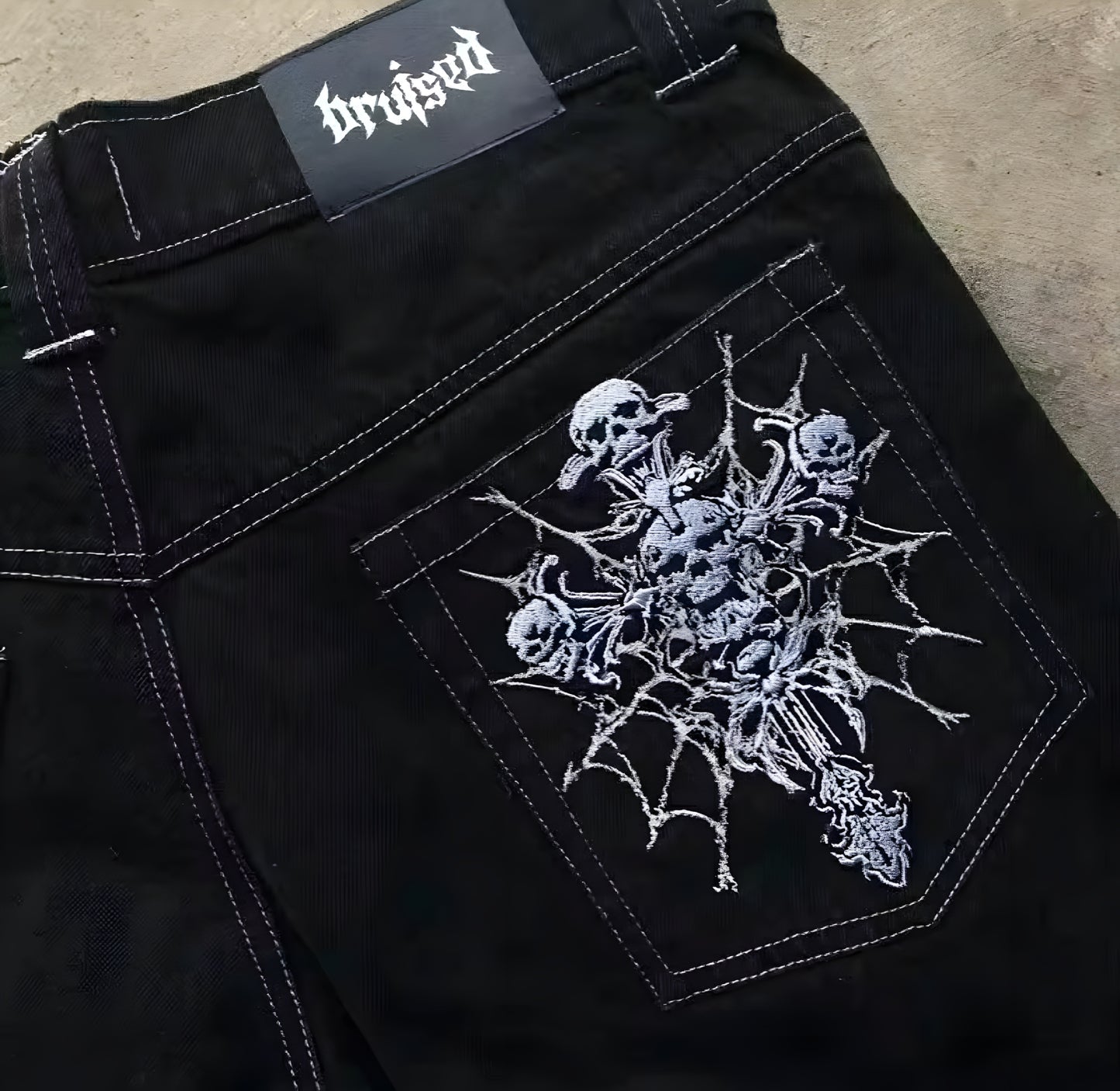 Skull cross baggy jeans